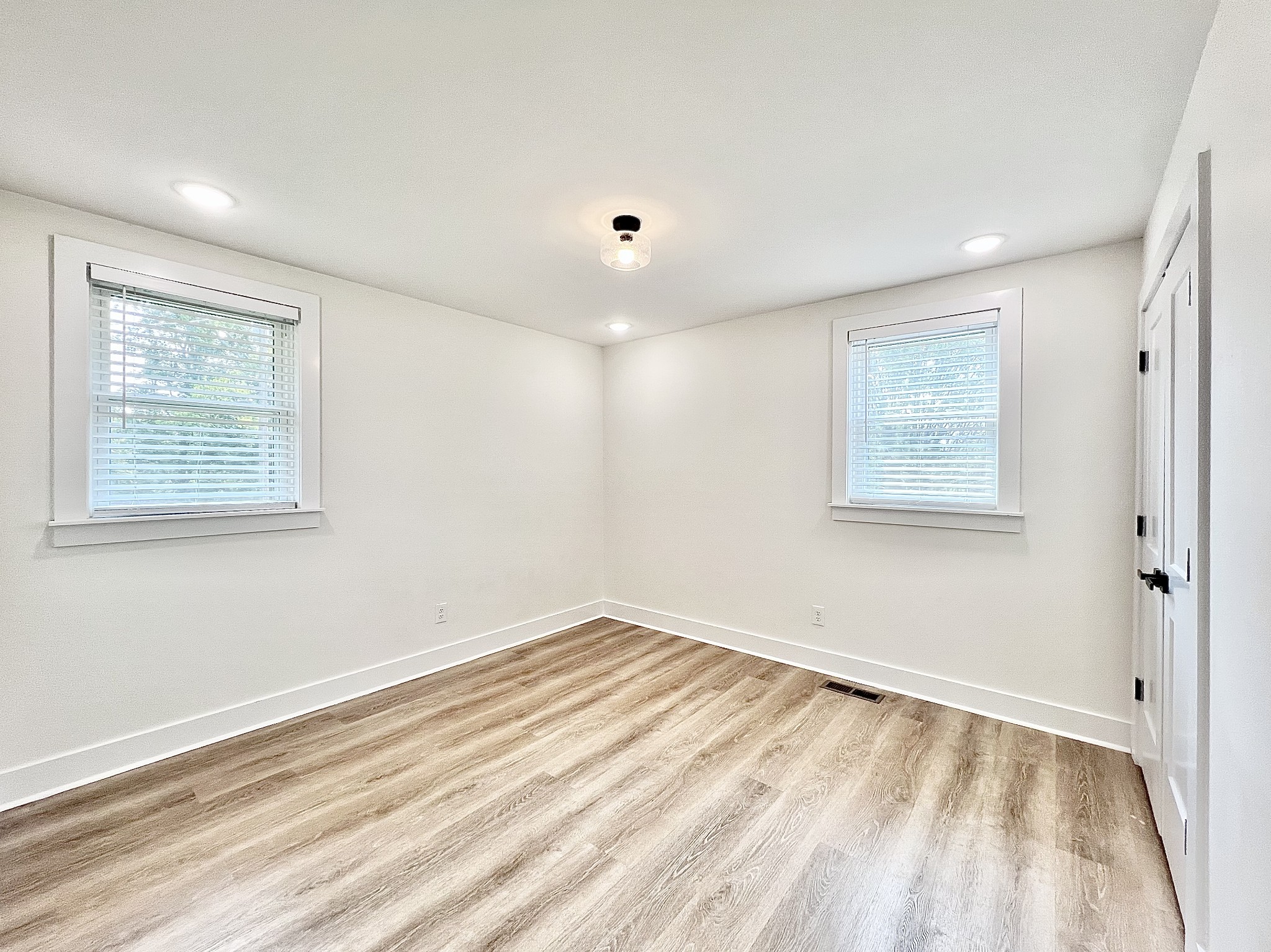 207 North Cedar Lane Pulaski, TN 38478 - Photo 31 of 66 a view of empty room with wooden floor