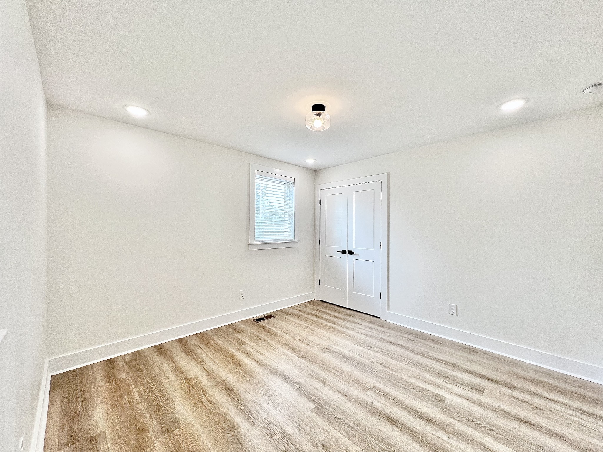 207 North Cedar Lane Pulaski, TN 38478 - Photo 32 of 66 wooden floor in an empty room with a window