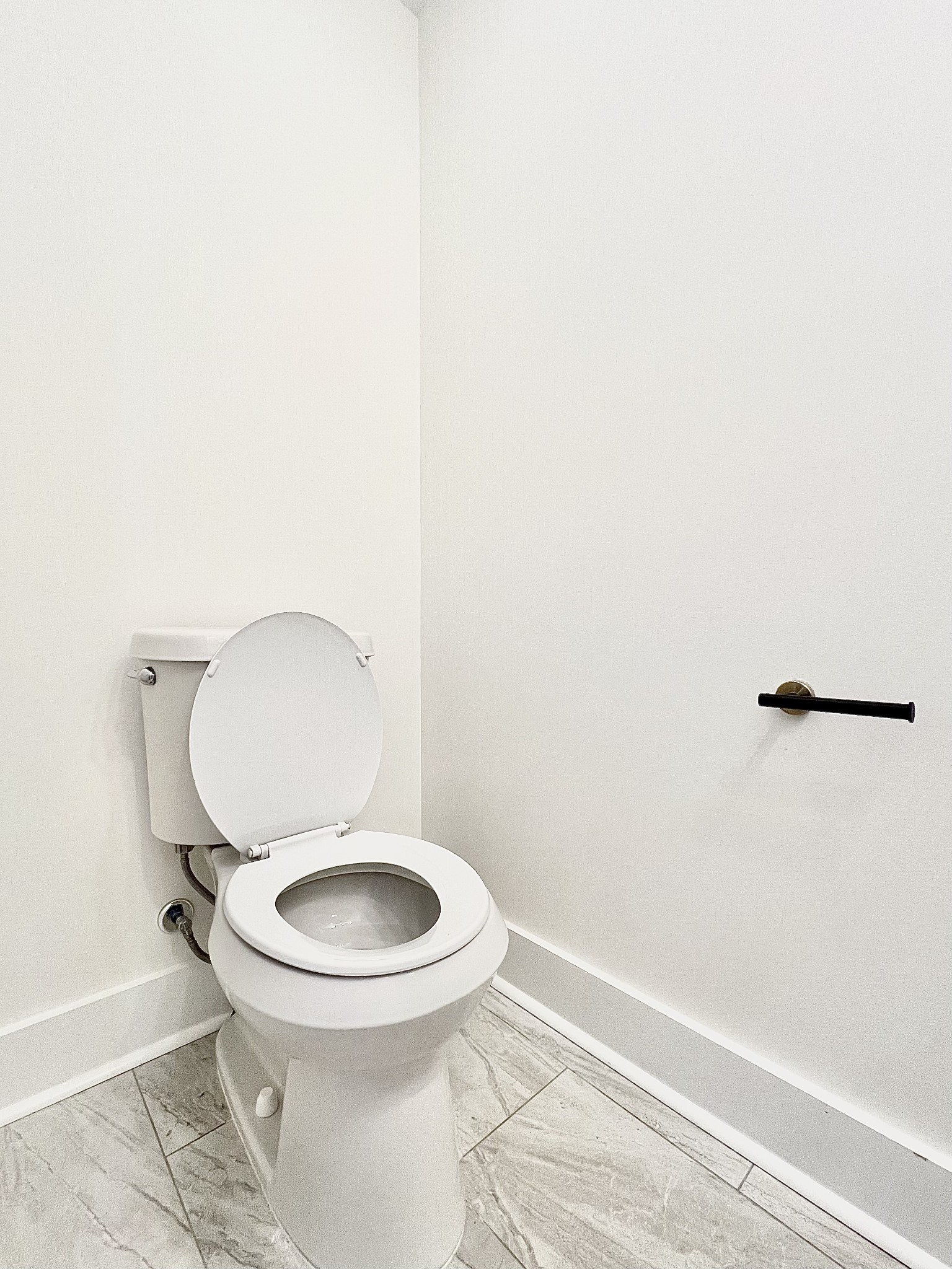 207 North Cedar Lane Pulaski, TN 38478 - Photo 43 of 66 a white toilet sitting next to a white sink