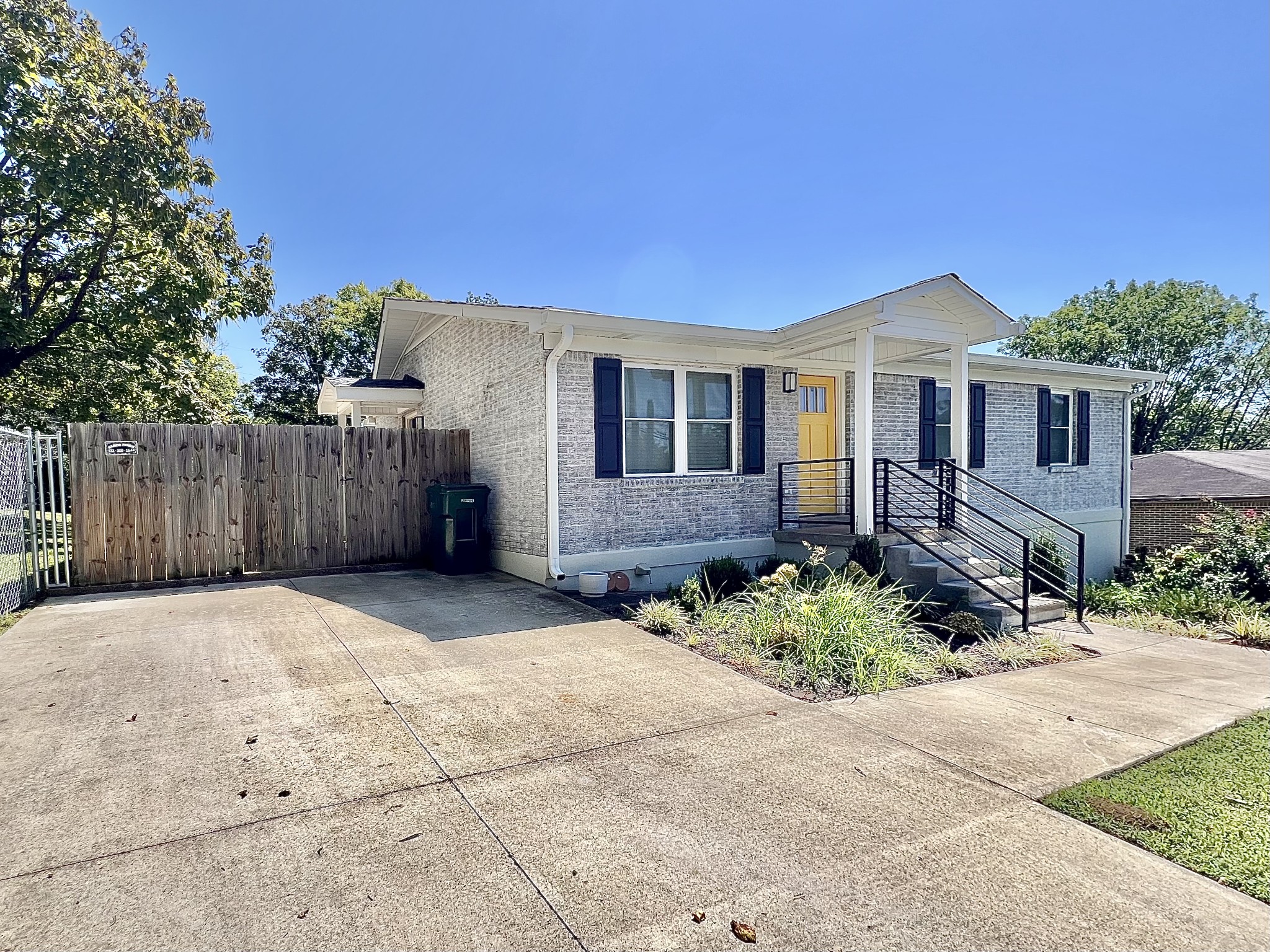 207 North Cedar Lane Pulaski, TN 38478 - Photo 49 of 66 a front view of a house with a yard