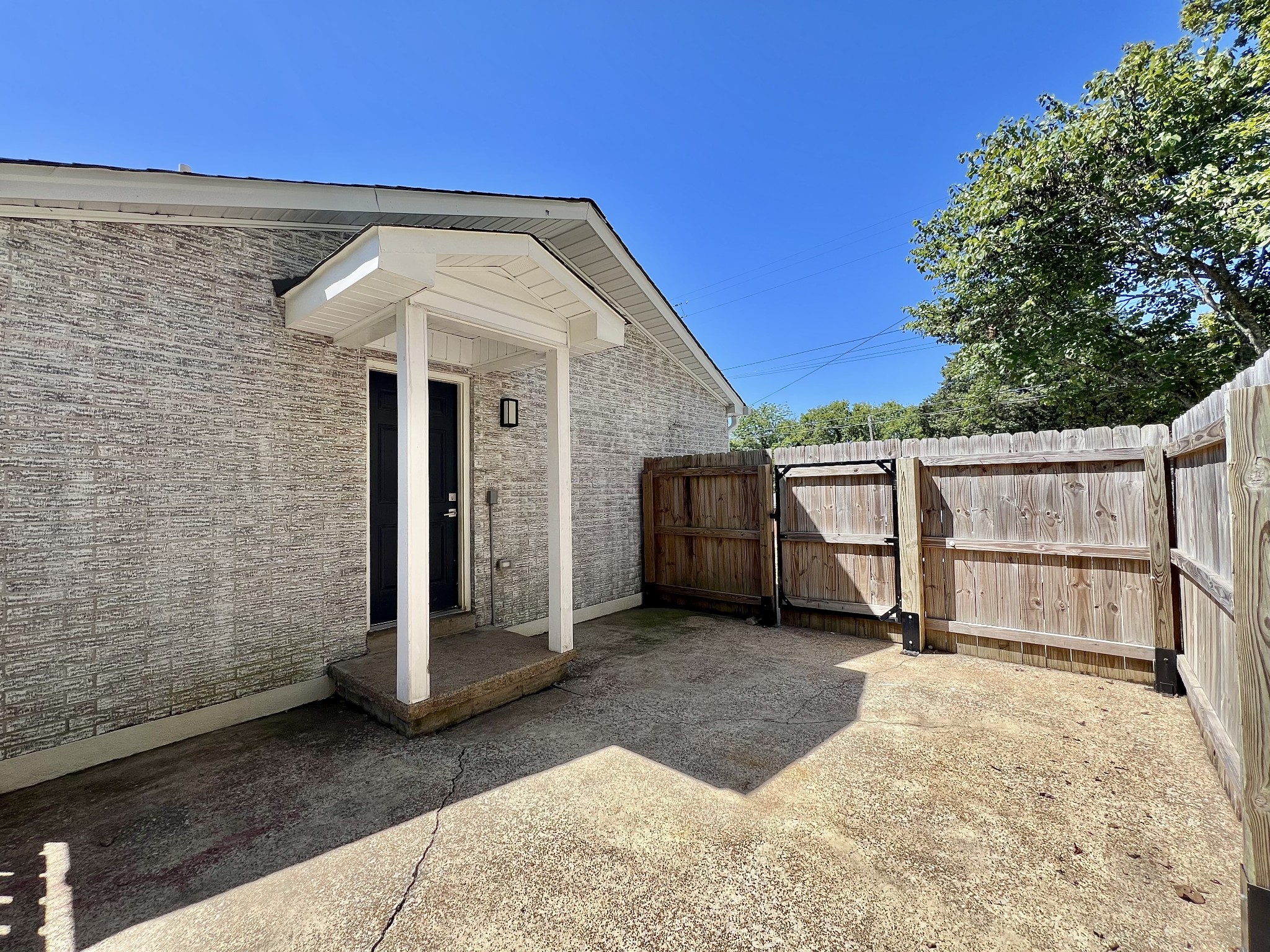 207 North Cedar Lane Pulaski, TN 38478 - Photo 51 of 66 a view of a house with a barbeque and wooden fence