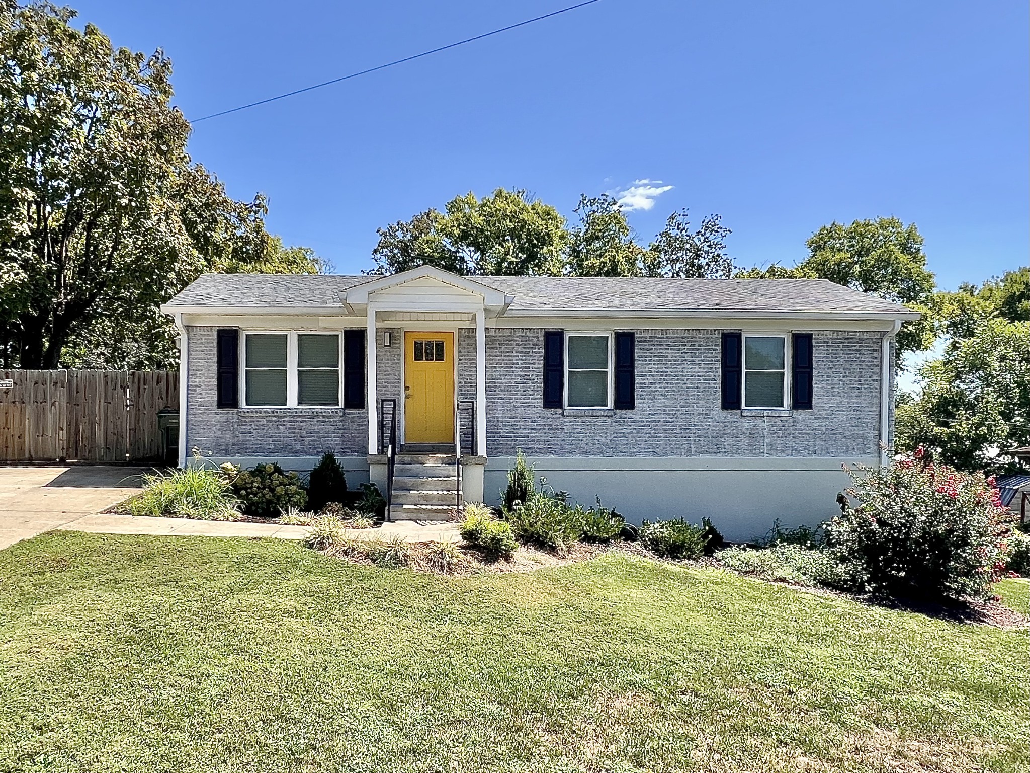 207 North Cedar Lane Pulaski, TN 38478 - Photo 66 of 66 a front view of a house with a yard