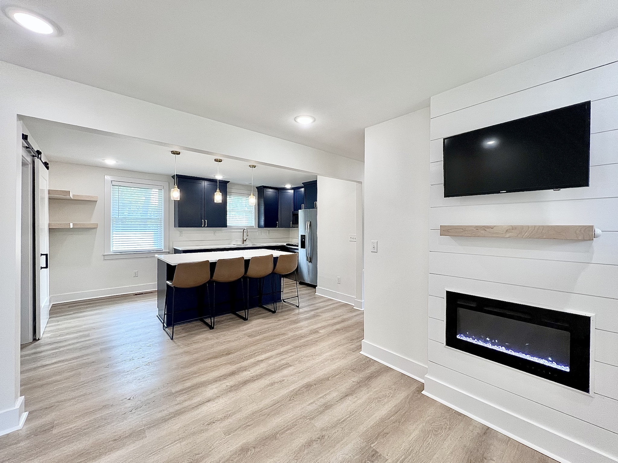 207 North Cedar Lane Pulaski, TN 38478 - Photo 7 of 66 a living room with a flat screen tv and a fireplace