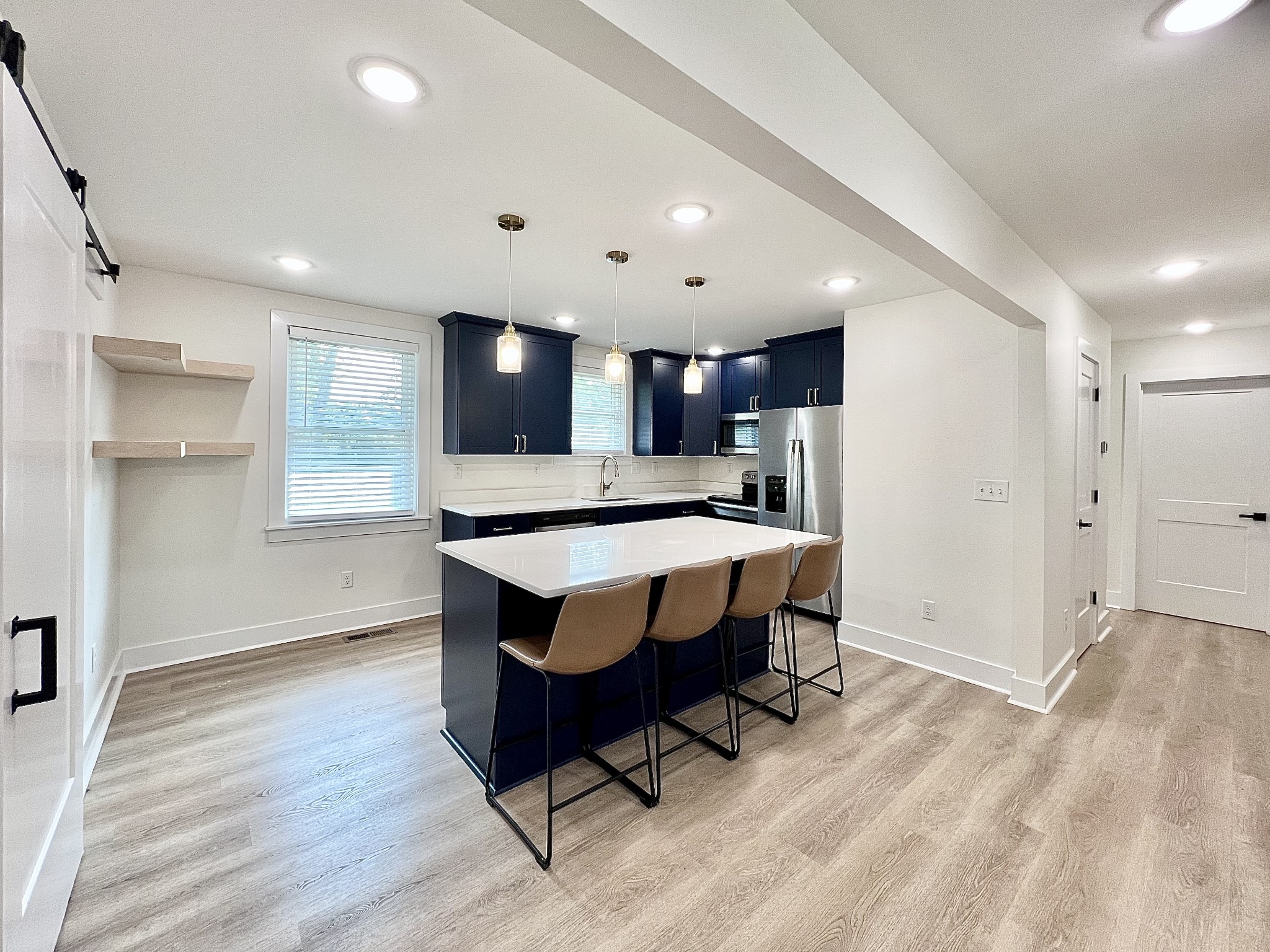 207 North Cedar Lane Pulaski, TN 38478 - Photo 9 of 66 a room with wooden floor and furniture