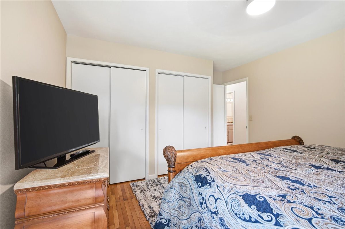 203 Highview Drive Eureka, IL 61530 - Photo 16 of 49 a bedroom with a bed and a flat screen tv