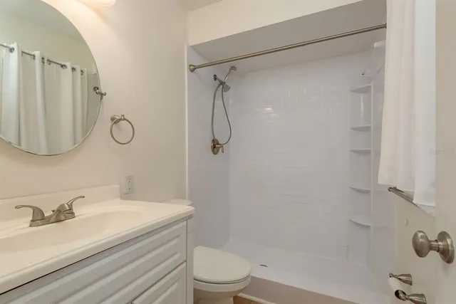 a view of a big room with carpet