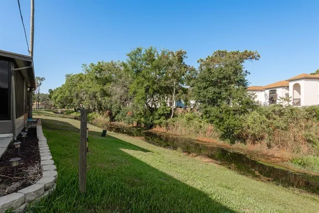 a house view with a garden space
