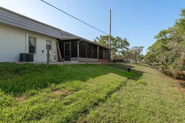 a view of a back yard of the house