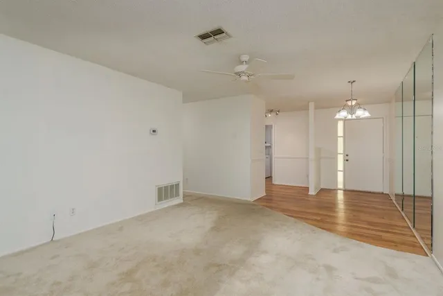 an empty room with a bathroom