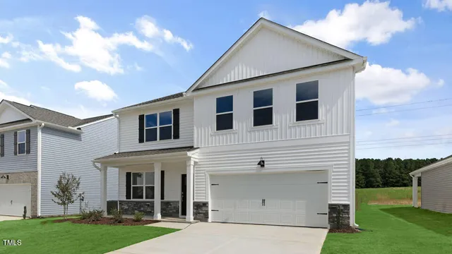 a view of a back yard of the house