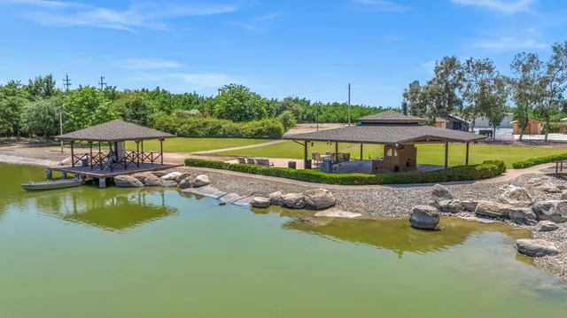 a view of a swimming pool with lounge chair