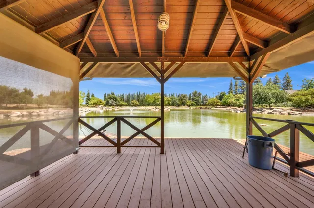 a view of parking garage with cars