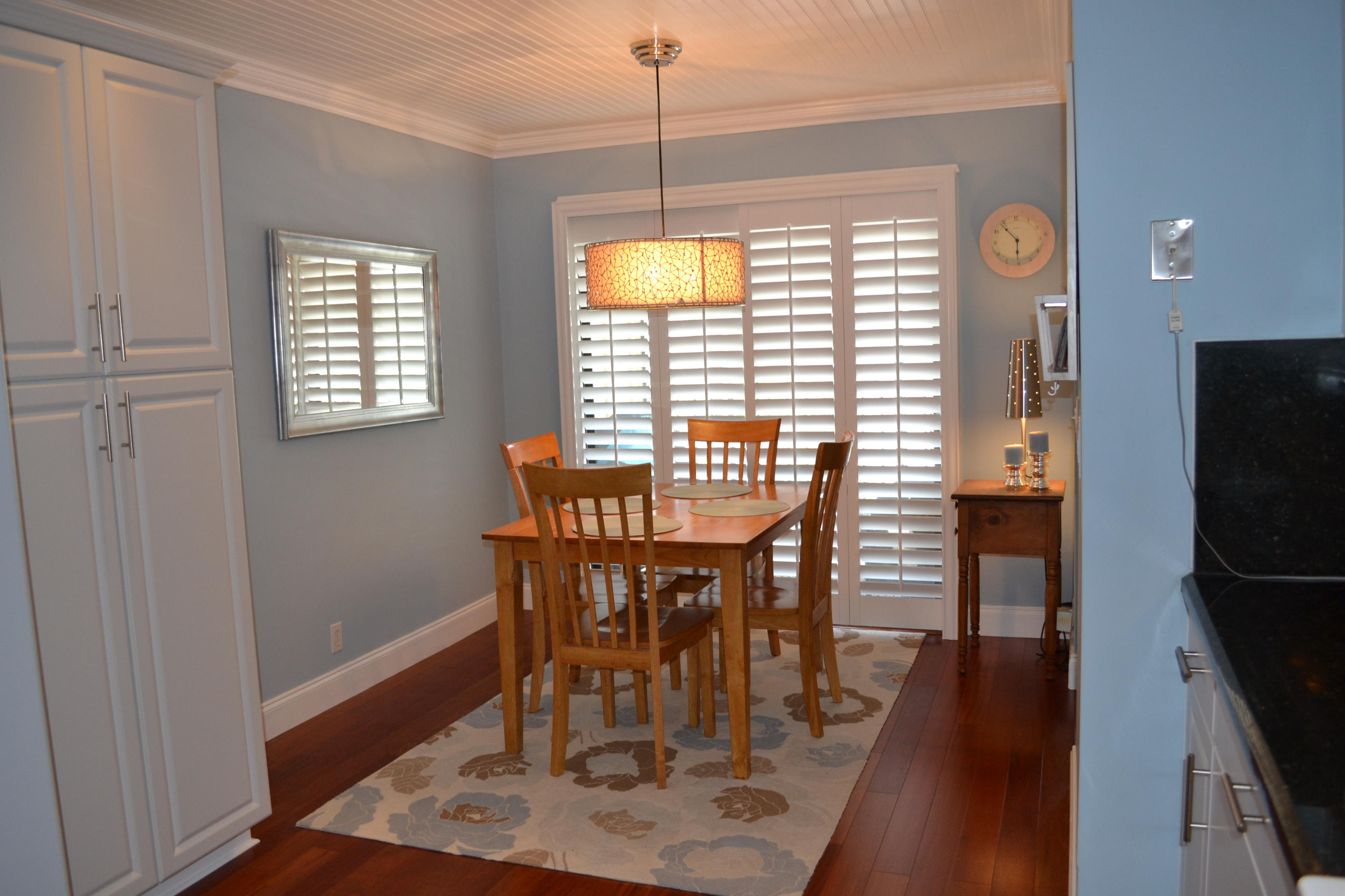 201 Southwest 1st Street, Unit 8 Boca Raton, FL 33432 - Photo 9 of 27 a dining room with furniture and window