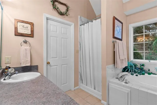 a bedroom with a bed and furniture