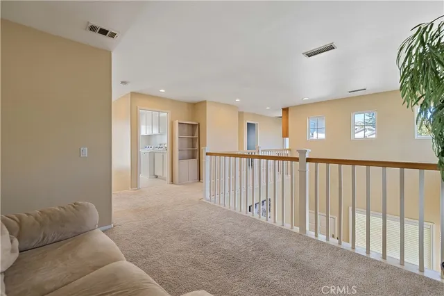 a bathroom with a bathtub and a window