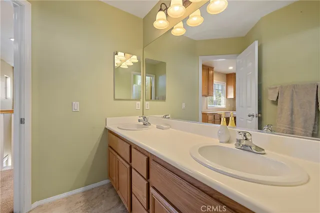 a view of a kitchen with a sink and stove
