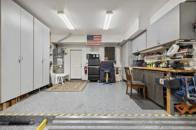 a view of a house with backyard porch and sitting area