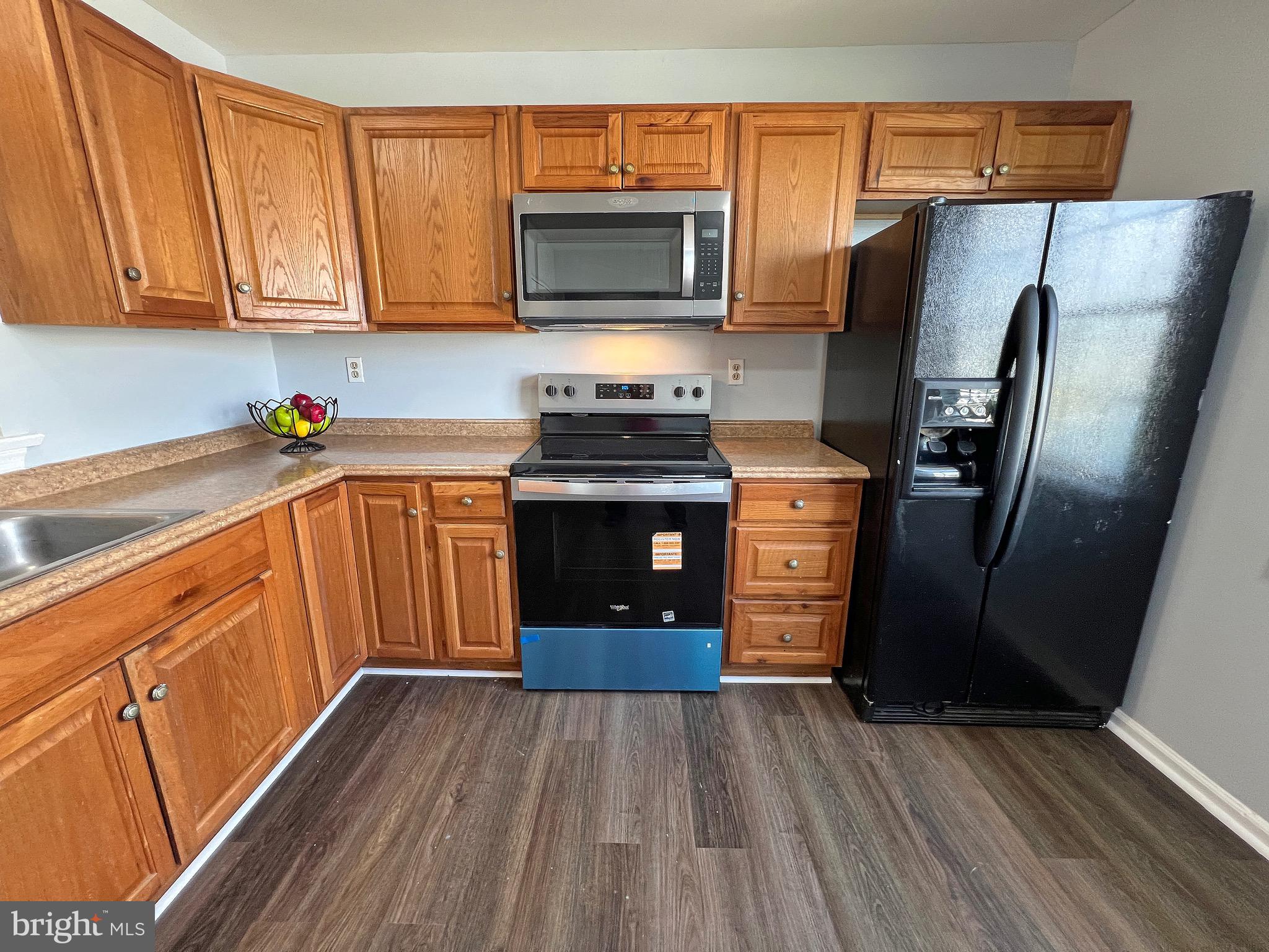 1049 Old Forge Road New Castle, DE 19720 - Photo 3 of 27 Renovated kitchen open to the living & dining room