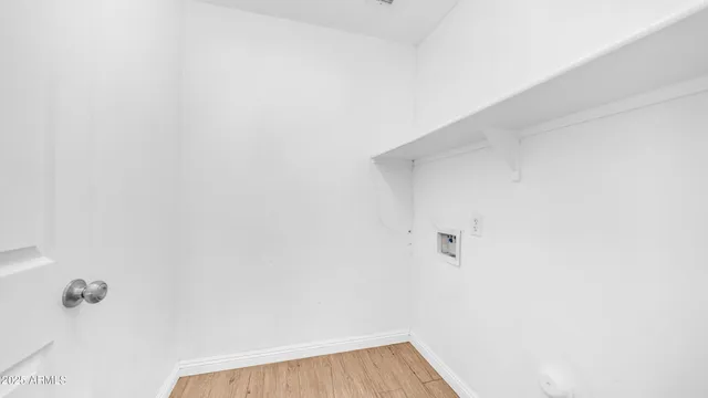 a kitchen with stainless steel appliances granite countertop a refrigerator sink and cabinets