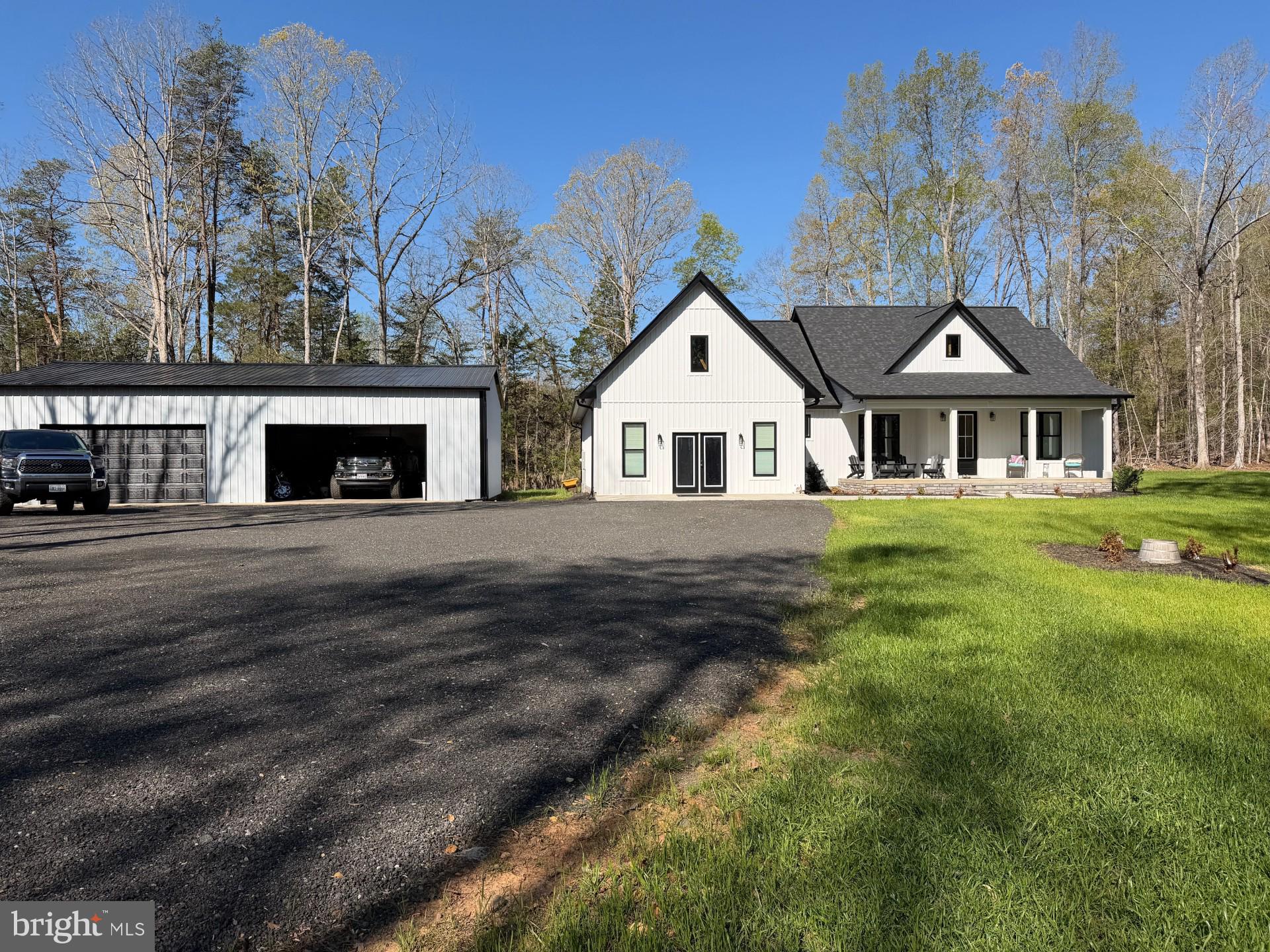 26340 Old Mill Road Unionville, VA 22567 - Photo 2 of 3 a front view of a house with a yard