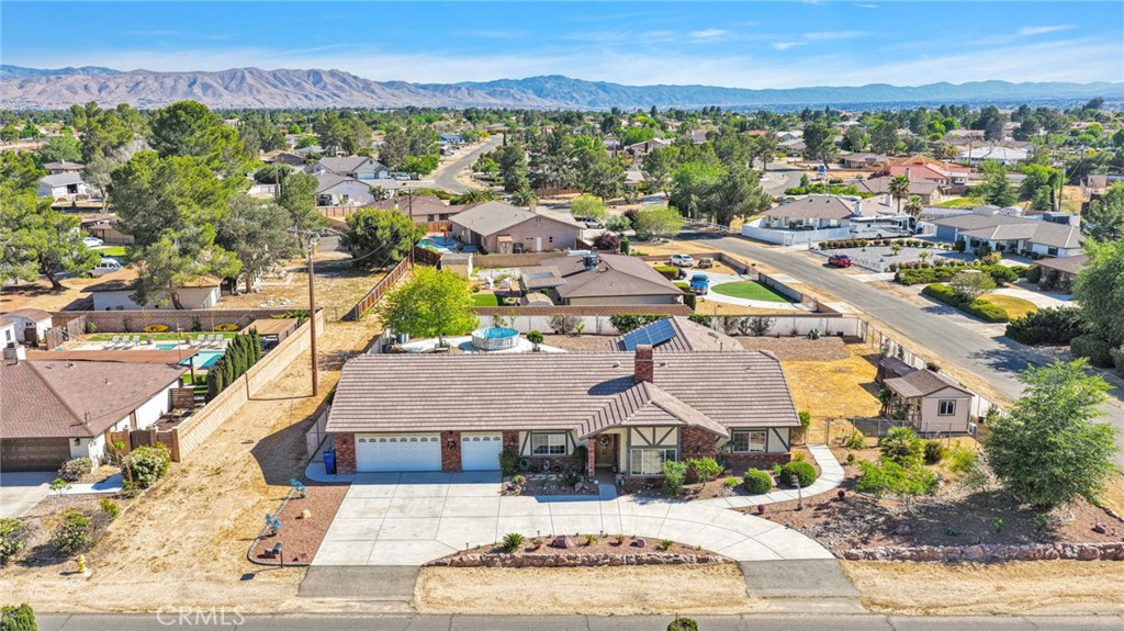 19985 Red Feather Road Apple Valley, CA 92307 - Photo 2 of 56 a aerial view of residential houses with outdoor space and swimming pool