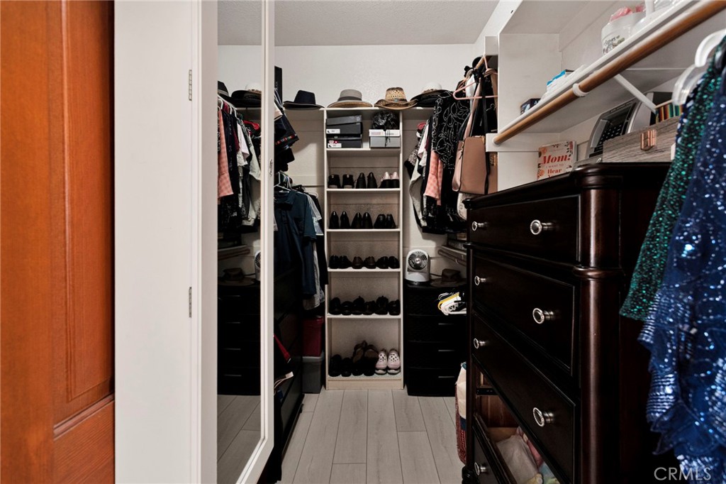 19985 Red Feather Road Apple Valley, CA 92307 - Photo 29 of 56 a view of walk in closet