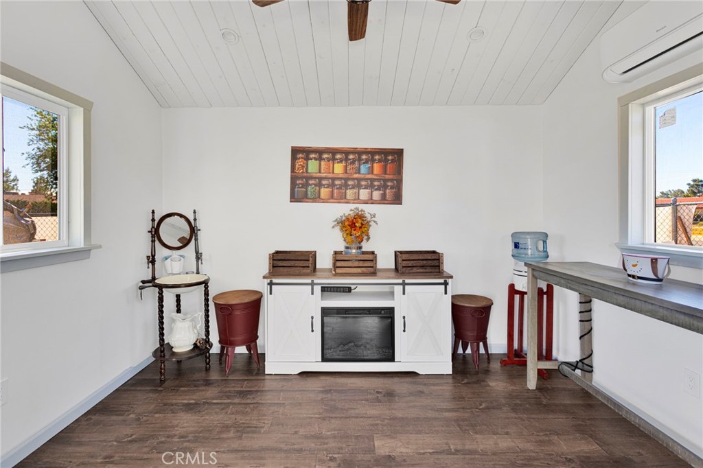 19985 Red Feather Road Apple Valley, CA 92307 - Photo 49 of 56 a view of kitchen with furniture wooden floor and window