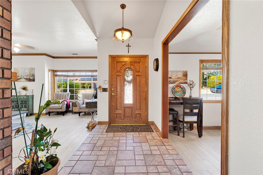 19985 Red Feather Road Apple Valley, CA 92307 - Photo 5 of 56 a view of a entryway door with interior