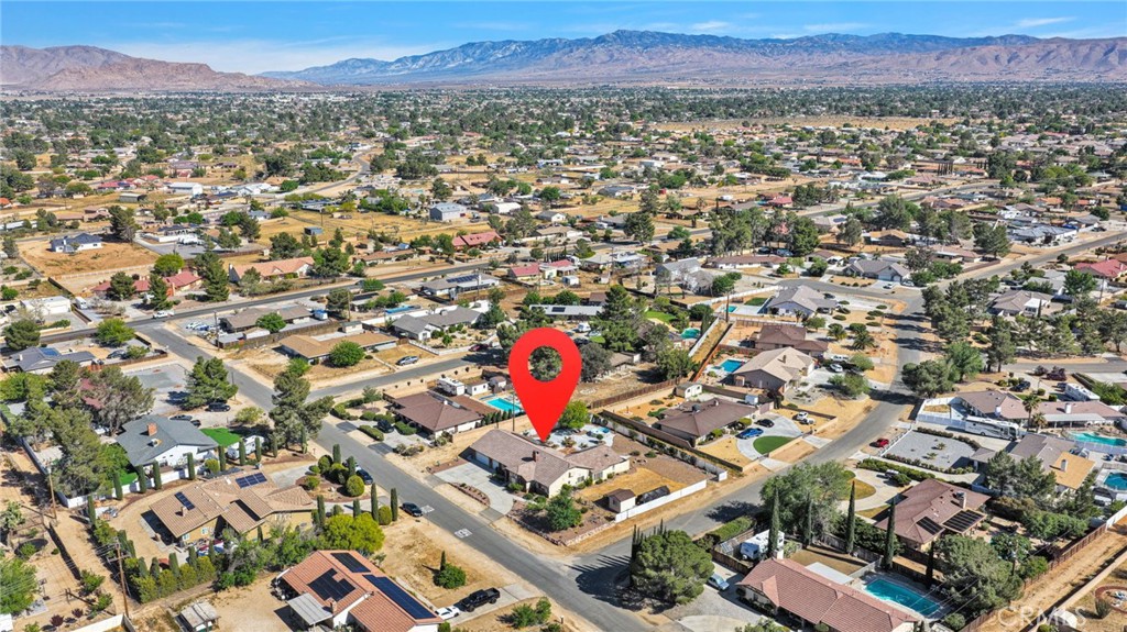 19985 Red Feather Road Apple Valley, CA 92307 - Photo 56 of 56 an aerial view of residential houses with outdoor space
