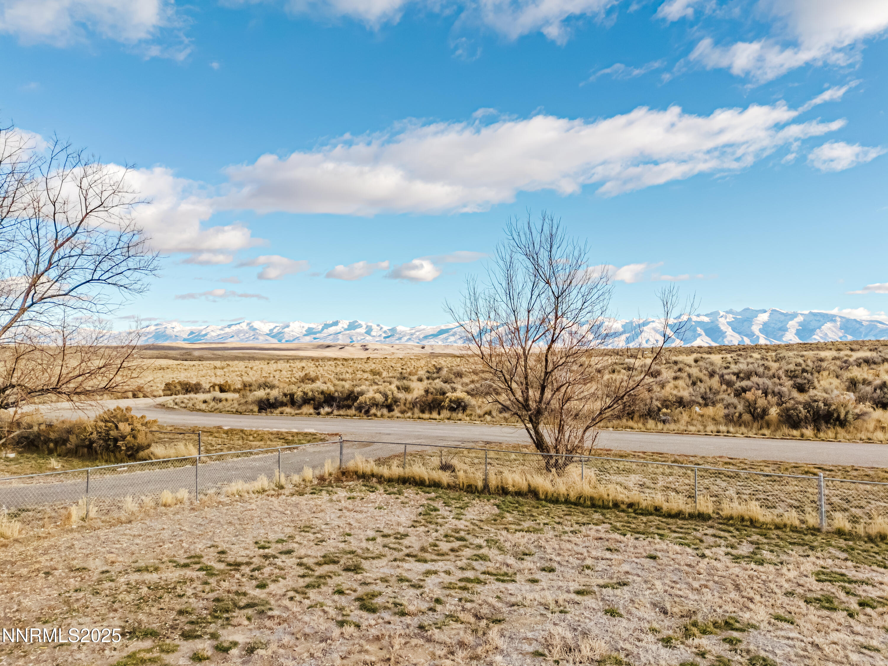 305 Kimble Drive Spring Creek, NV 89815 - Photo 1 of 31 a view of lake view and mountain