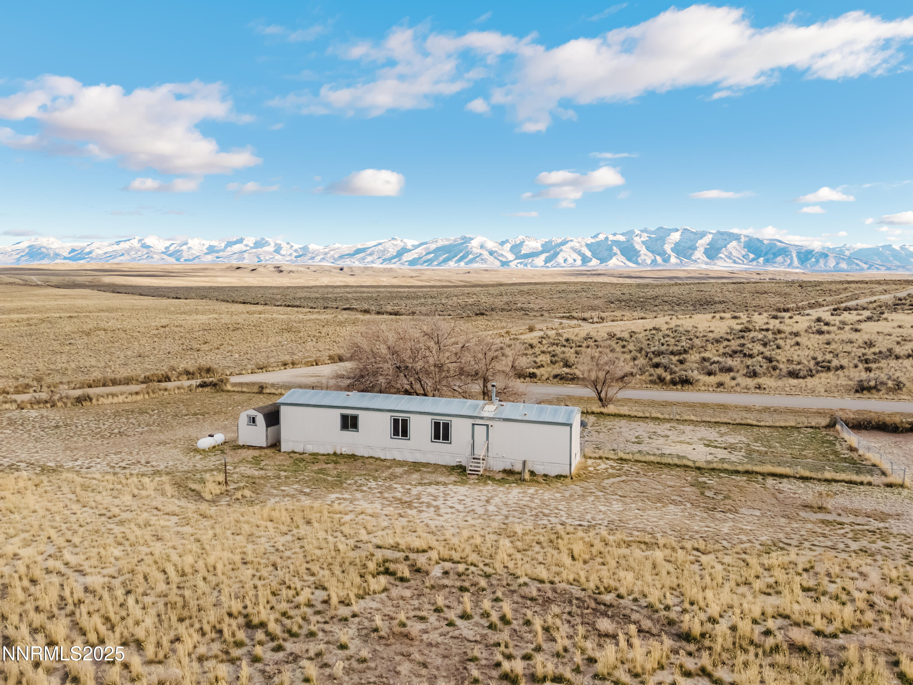 305 Kimble Drive Spring Creek, NV 89815 - Photo 16 of 31 a view of a ocean with beach