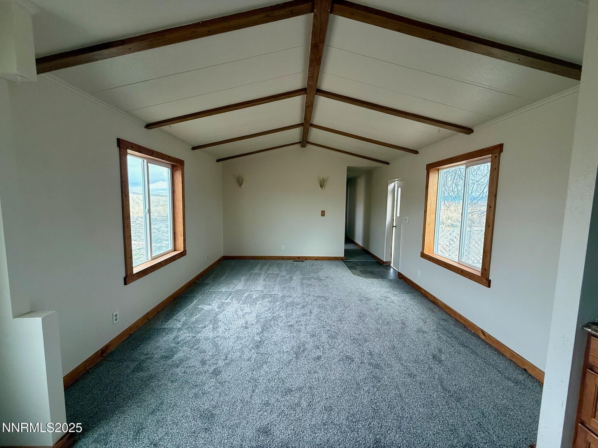 305 Kimble Drive Spring Creek, NV 89815 - Photo 23 of 31 a view of a livingroom with a window