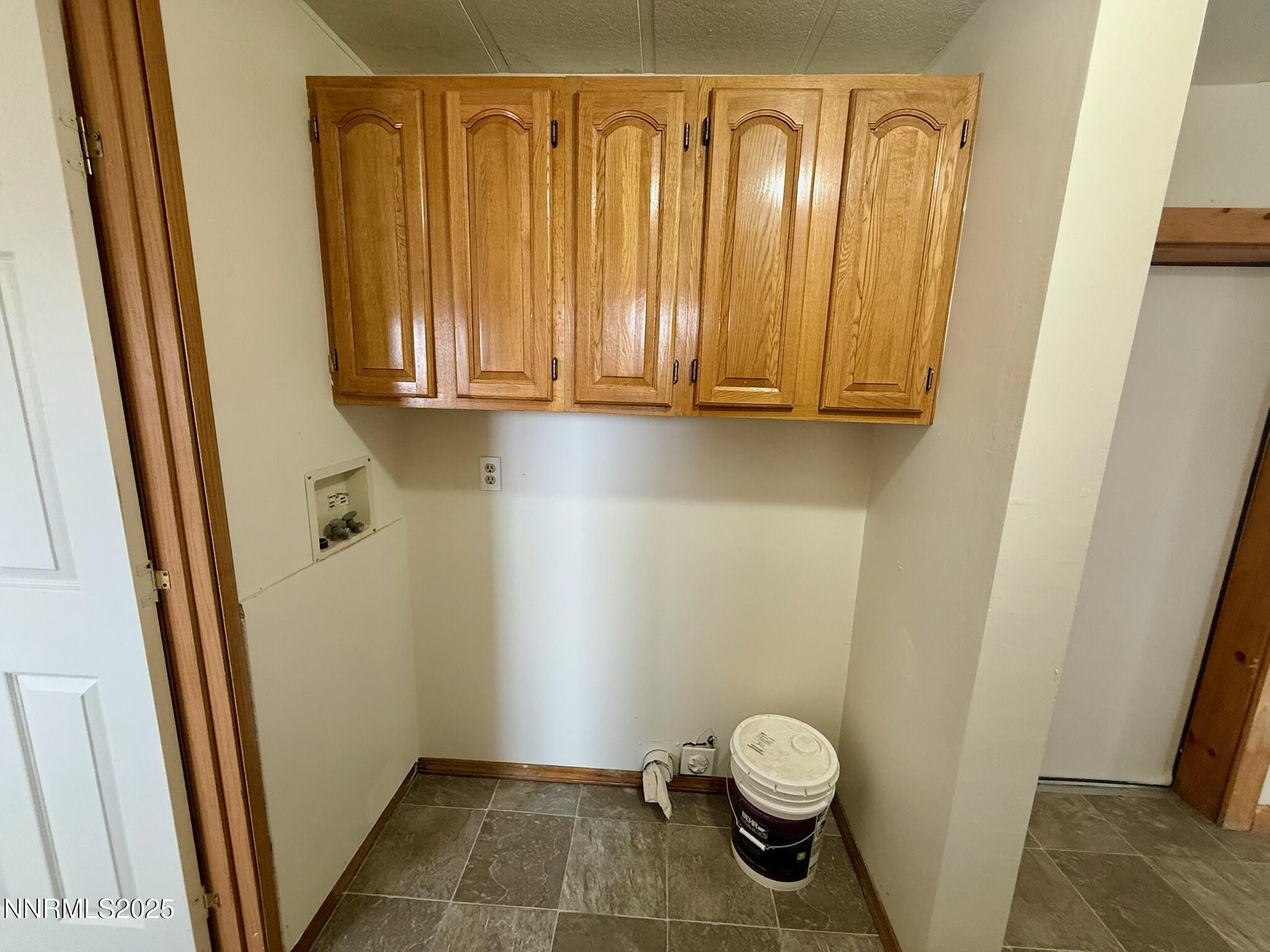 305 Kimble Drive Spring Creek, NV 89815 - Photo 27 of 31 a bathroom with a granite countertop sink and a mirror
