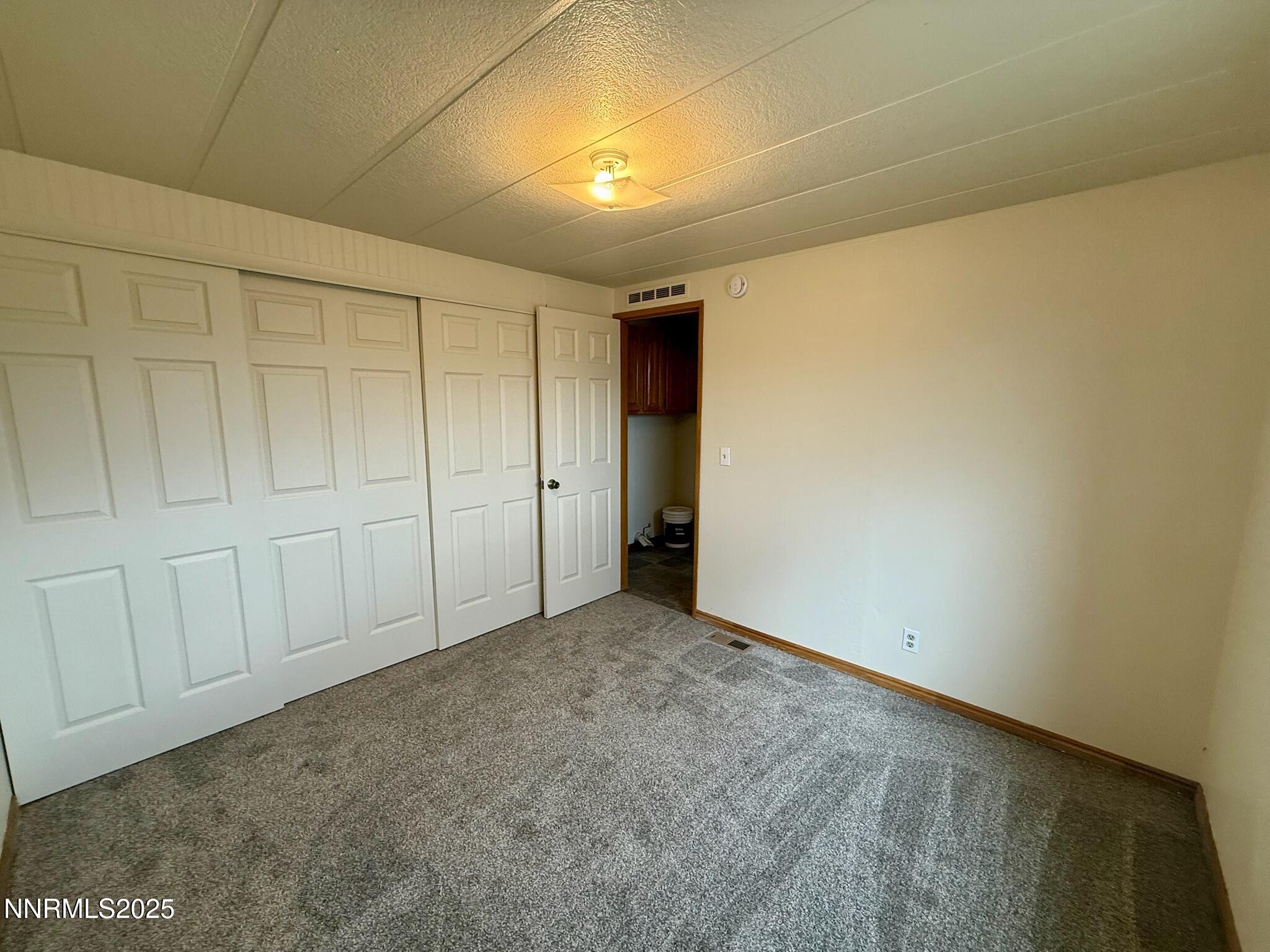 305 Kimble Drive Spring Creek, NV 89815 - Photo 30 of 31 a view of an empty room