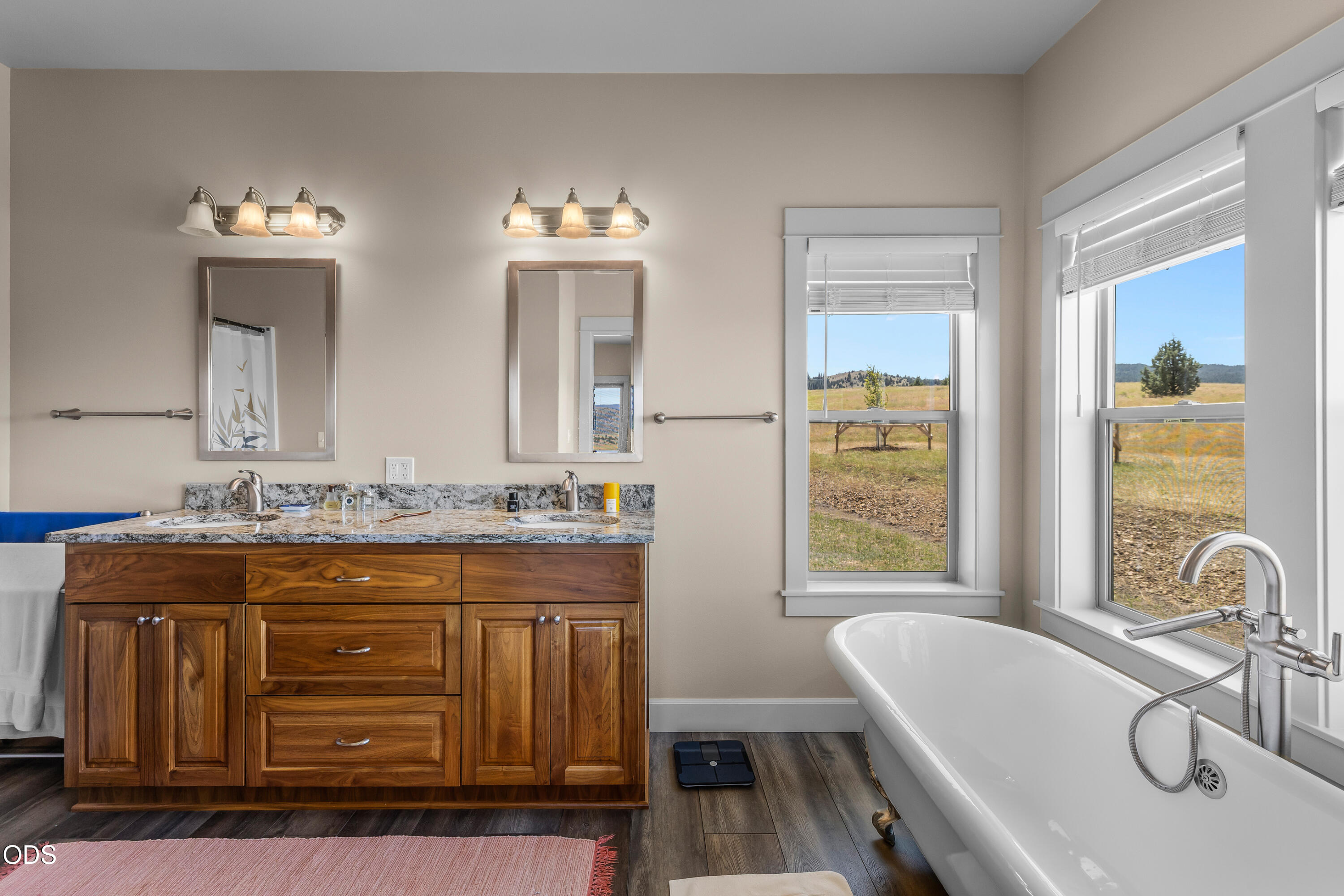 26216 West Bench Road John Day, OR 97845 - Photo 22 of 53 a en suite bathroom with a granite countertop sink and a large mirror