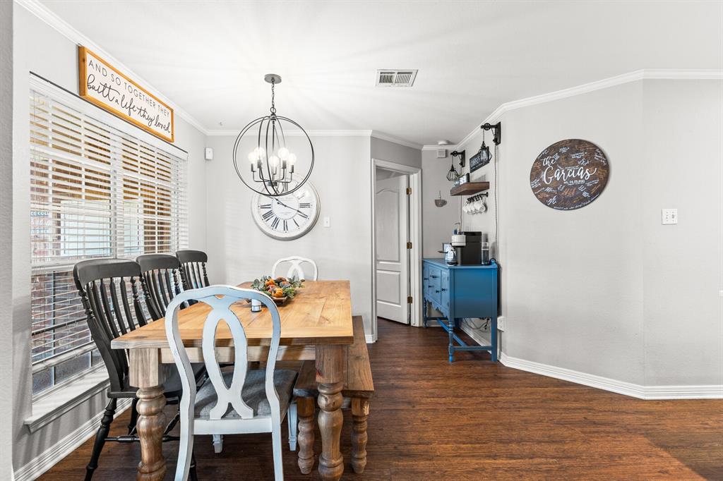 10616 Whitney Trace Drive Waco, TX 76708 - Photo 14 of 37 a view of a dining area with furniture window and wooden floor