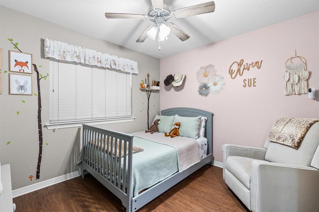 10616 Whitney Trace Drive Waco, TX 76708 - Photo 28 of 37 a bedroom with a bed and a window