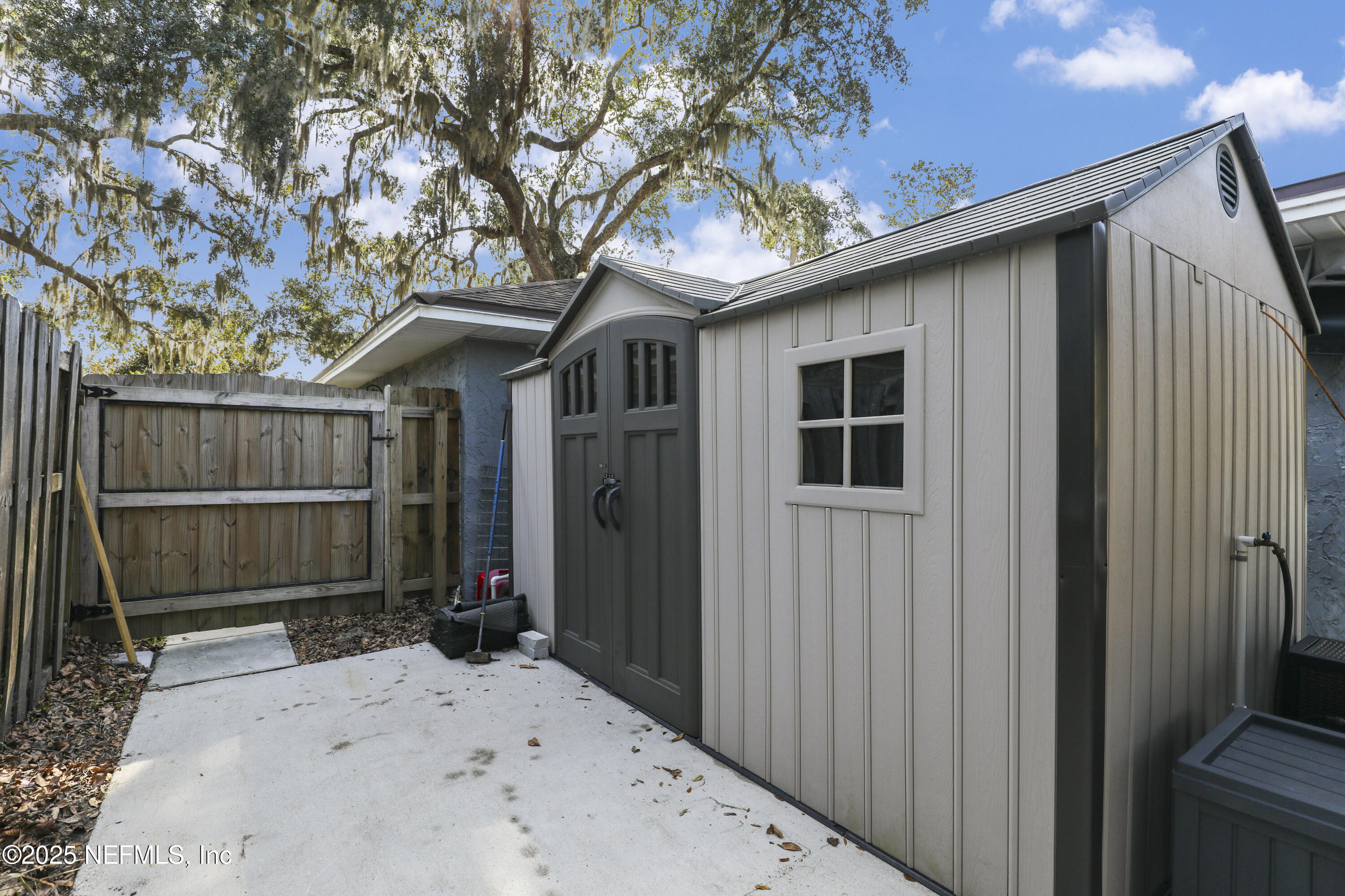 11265 Beacon Drive Jacksonville, FL 32225 - Photo 54 of 62 a front view of a house with a yard
