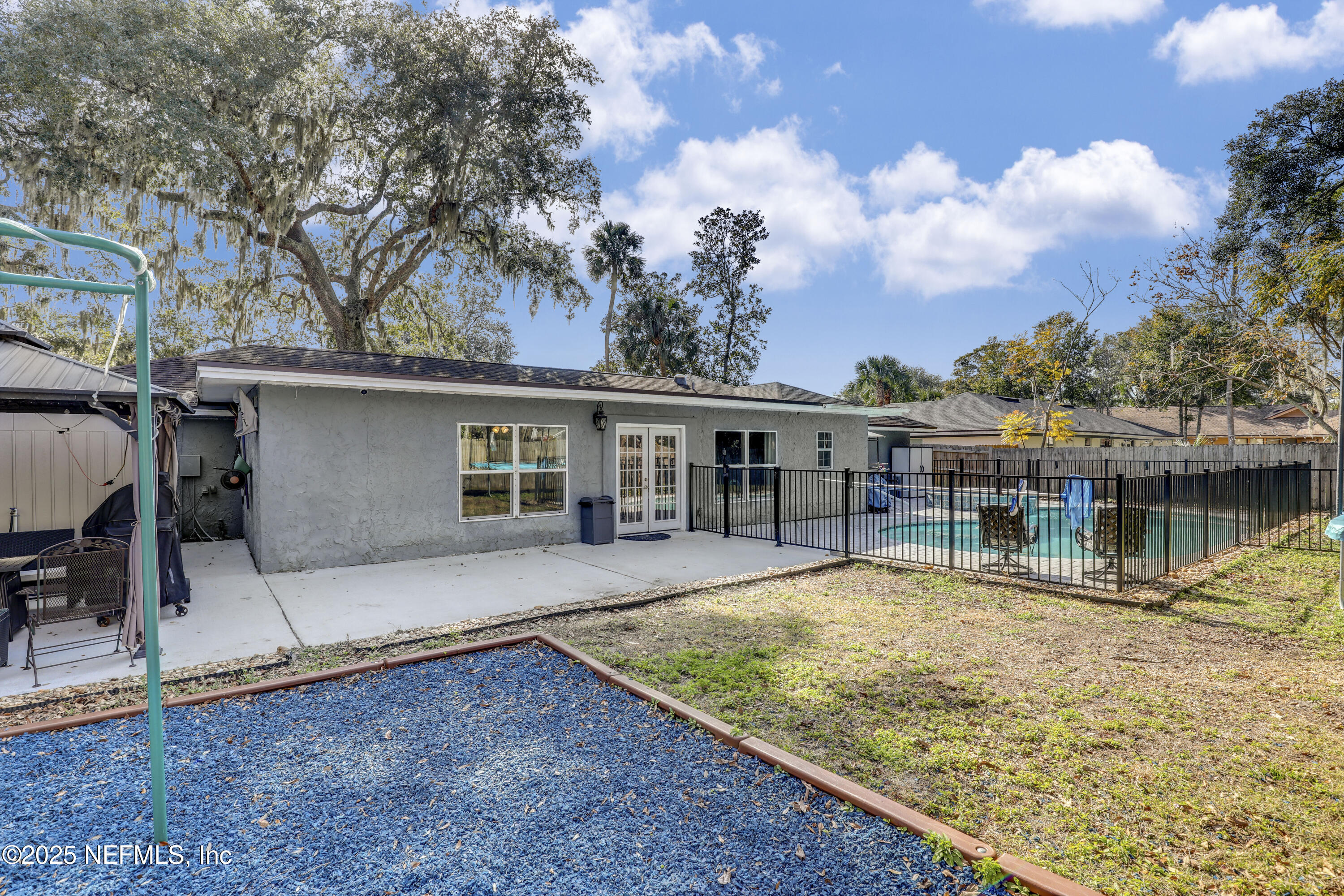 11265 Beacon Drive Jacksonville, FL 32225 - Photo 60 of 62 front view of a house with a patio
