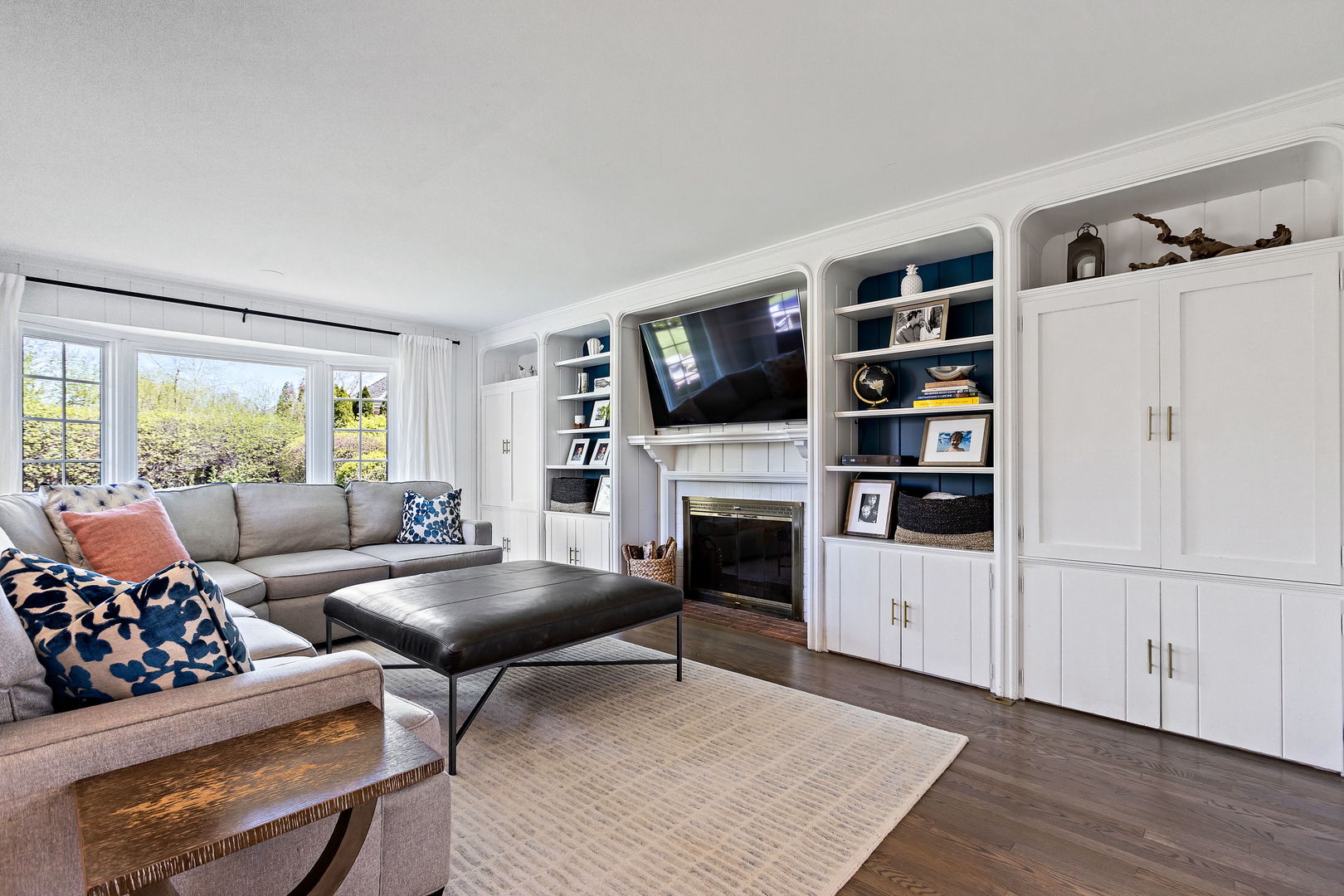 61 Coventry Road Northfield, IL 60093 - Photo 5 of 28 a living room with furniture and a fireplace