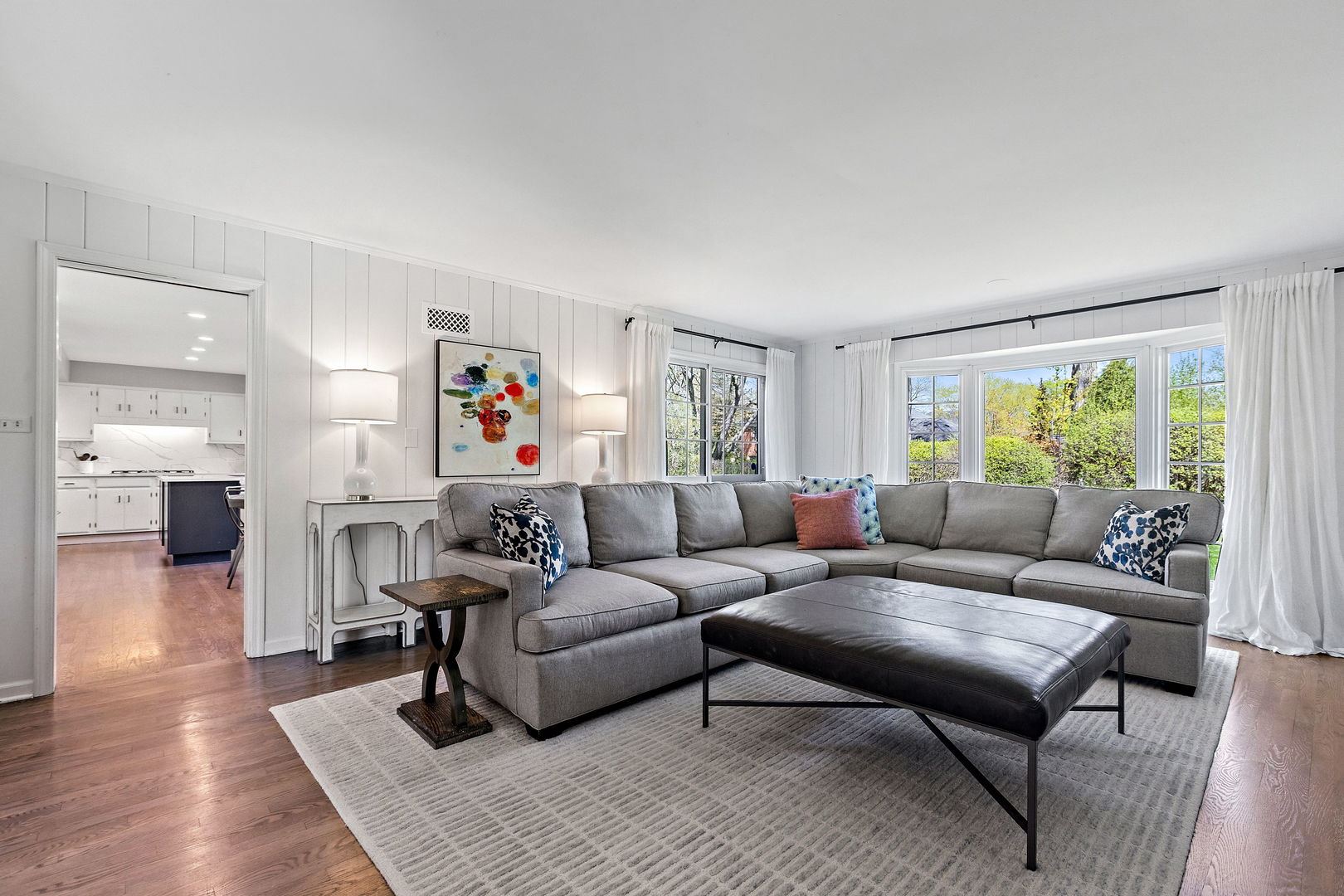 61 Coventry Road Northfield, IL 60093 - Photo 6 of 28 a living room with furniture and a large window