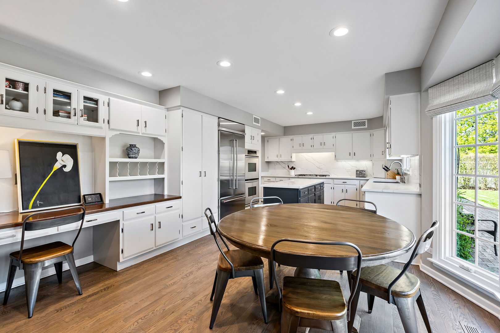 61 Coventry Road Northfield, IL 60093 - Photo 8 of 28 a dining room with furniture and window