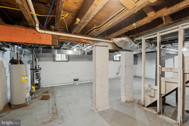 a view of empty room with wooden walls