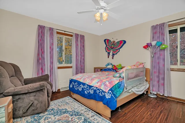 a bed room with a bed and a couch