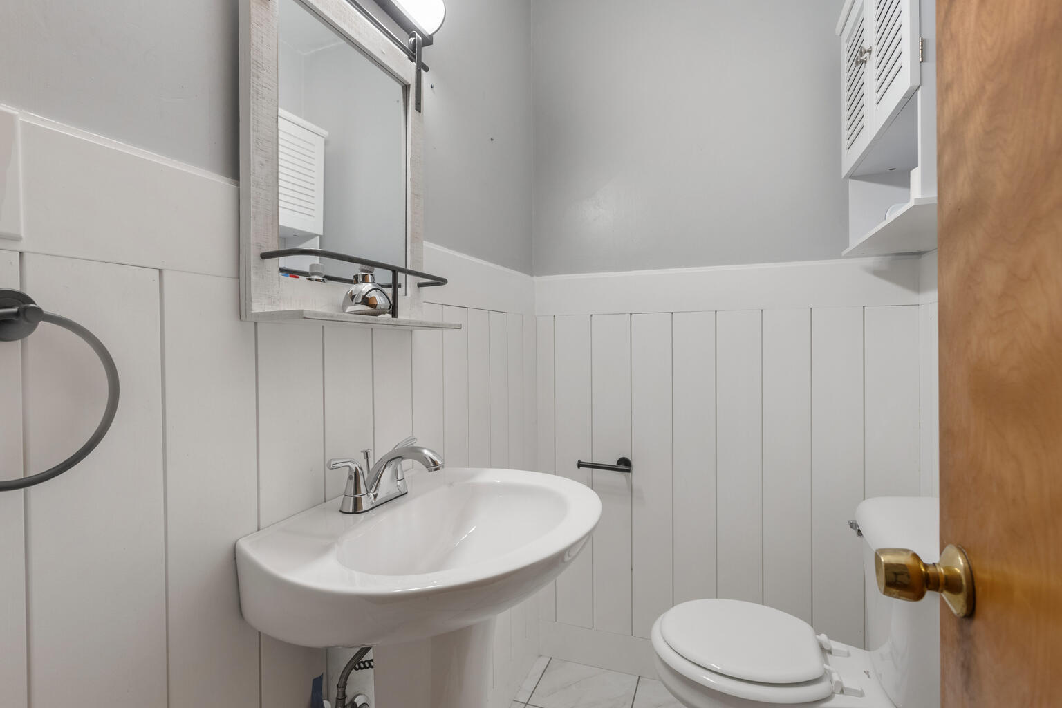 1405 Mayfair Road Champaign, IL 61821 - Photo 16 of 34 a bathroom with a sink a toilet and shower