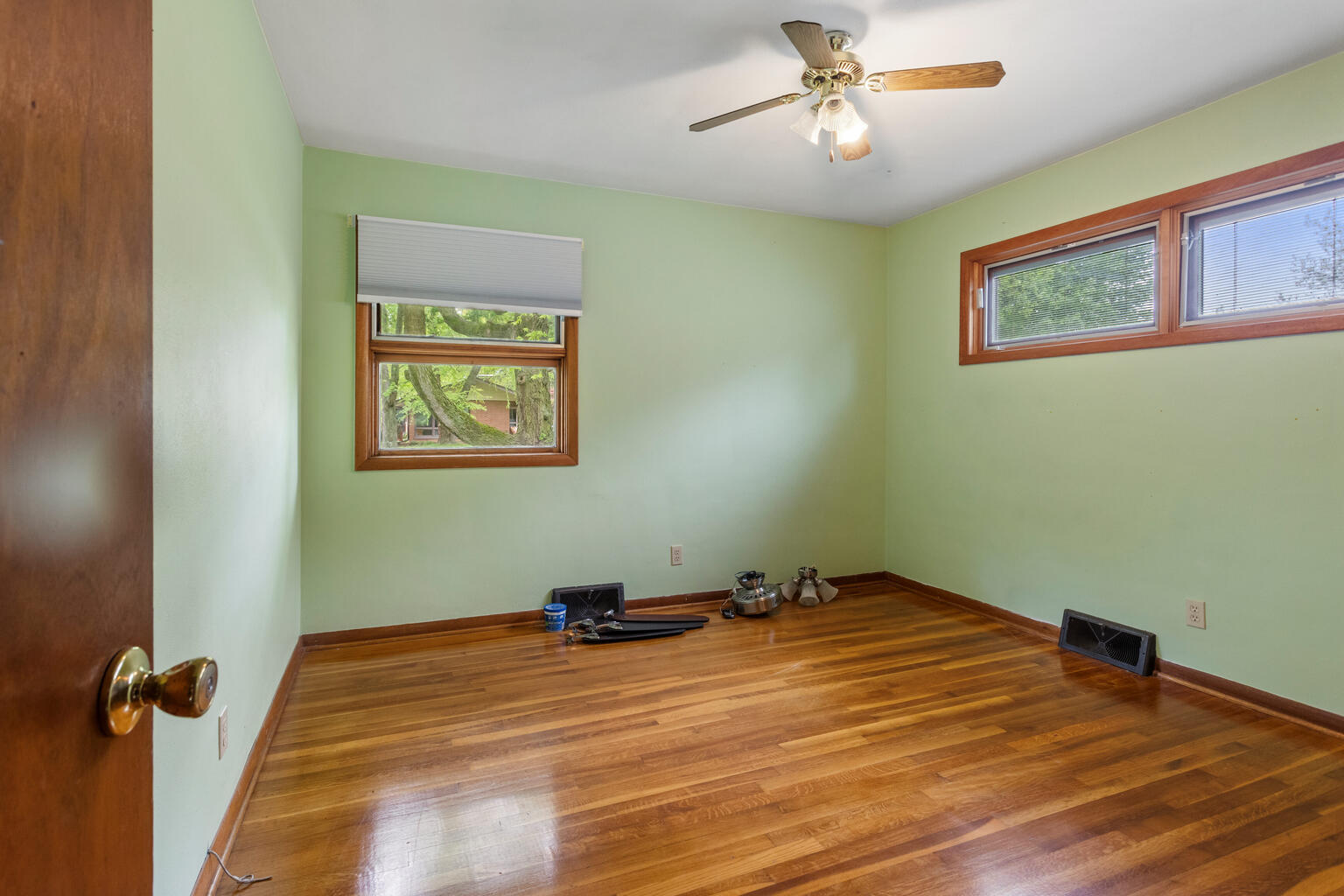 1405 Mayfair Road Champaign, IL 61821 - Photo 17 of 34 a room with a window and ceiling fan