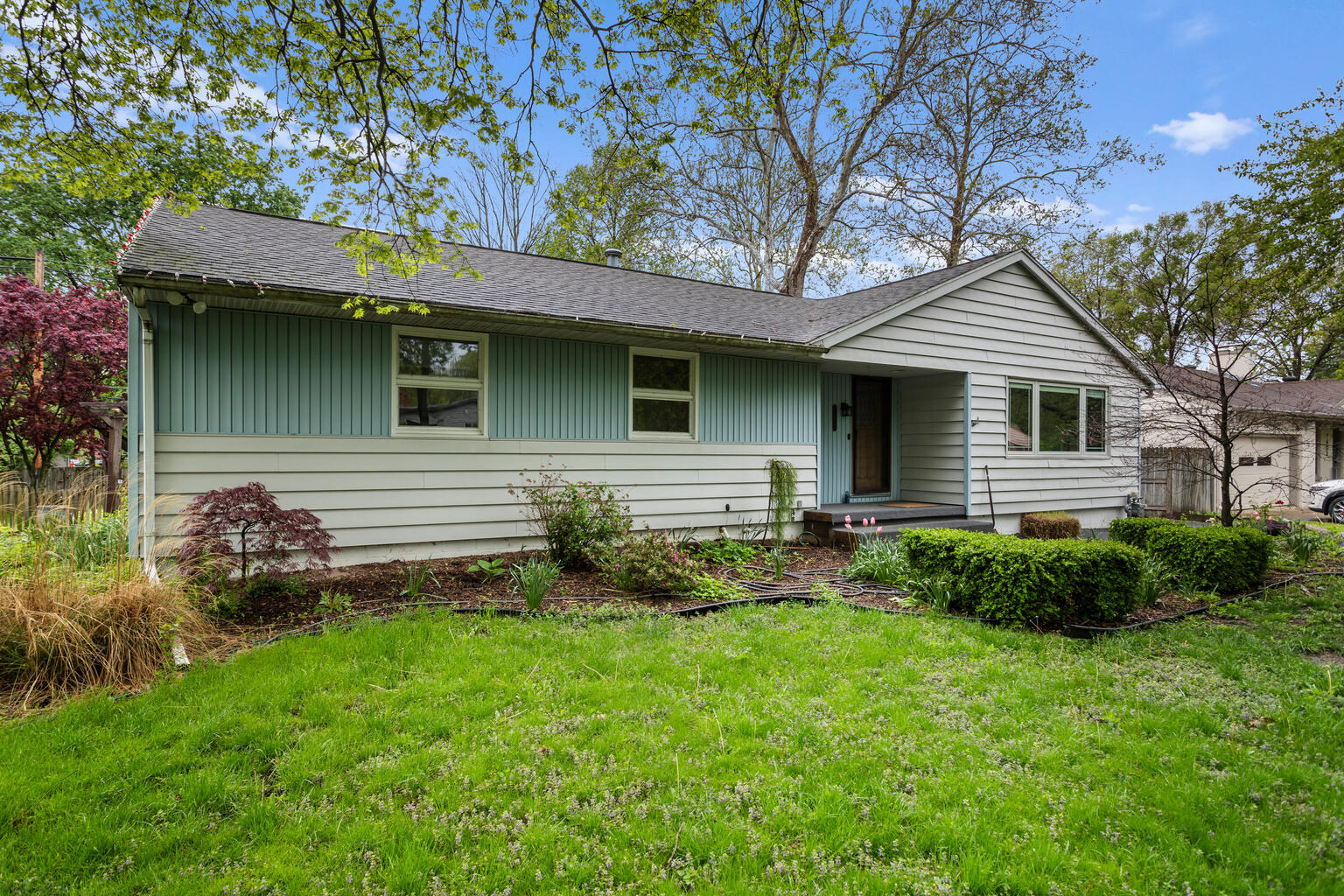 1405 Mayfair Road Champaign, IL 61821 - Photo 2 of 34 a front view of house with yard and green space