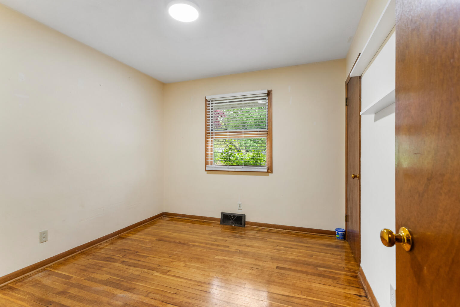 1405 Mayfair Road Champaign, IL 61821 - Photo 23 of 34 an empty room with a window