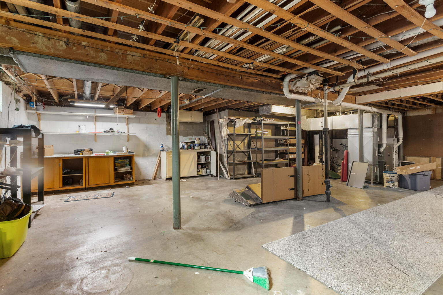 1405 Mayfair Road Champaign, IL 61821 - Photo 32 of 34 a view of a garage with wooden shelves