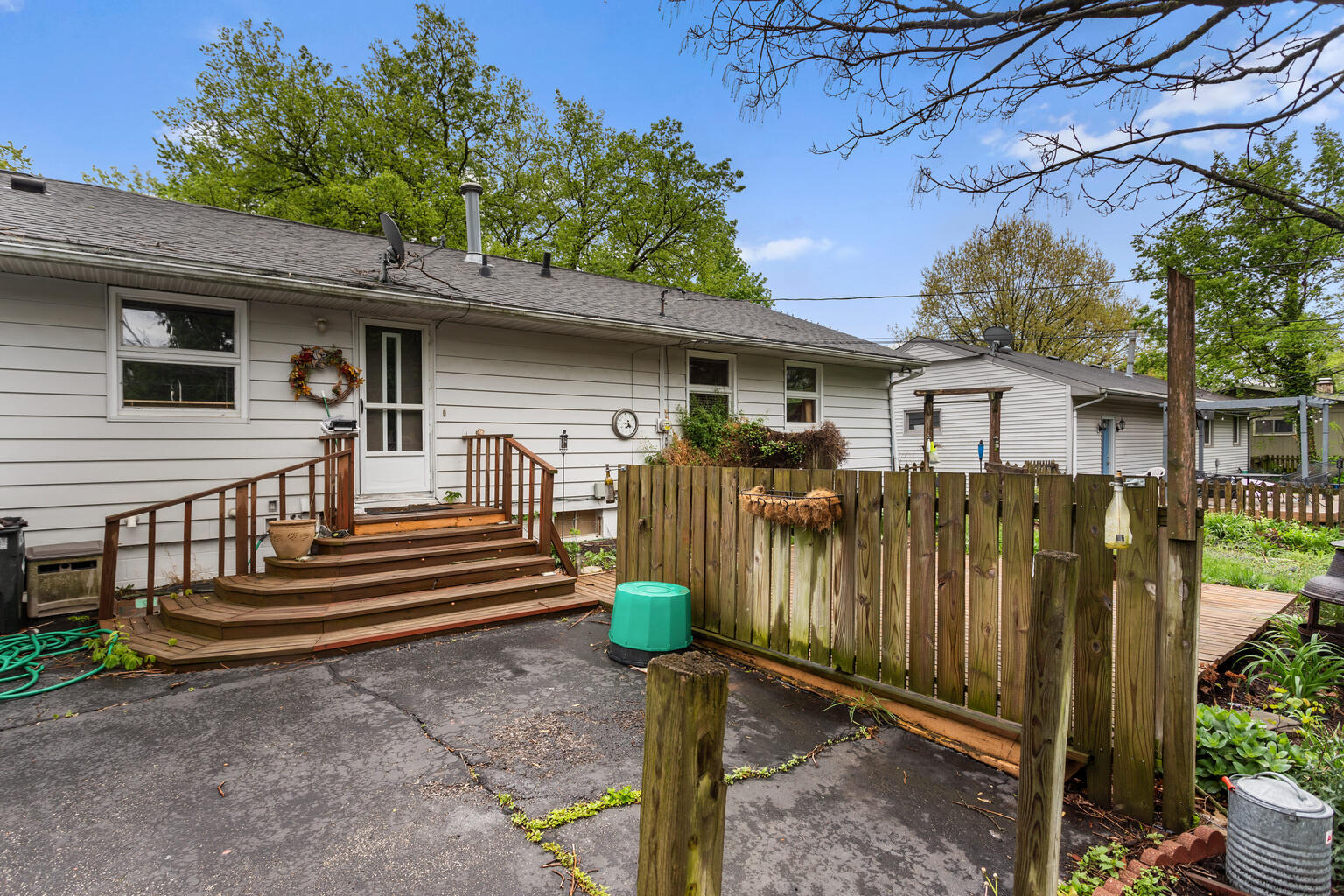 1405 Mayfair Road Champaign, IL 61821 - Photo 5 of 34 a front view of a house with a garden